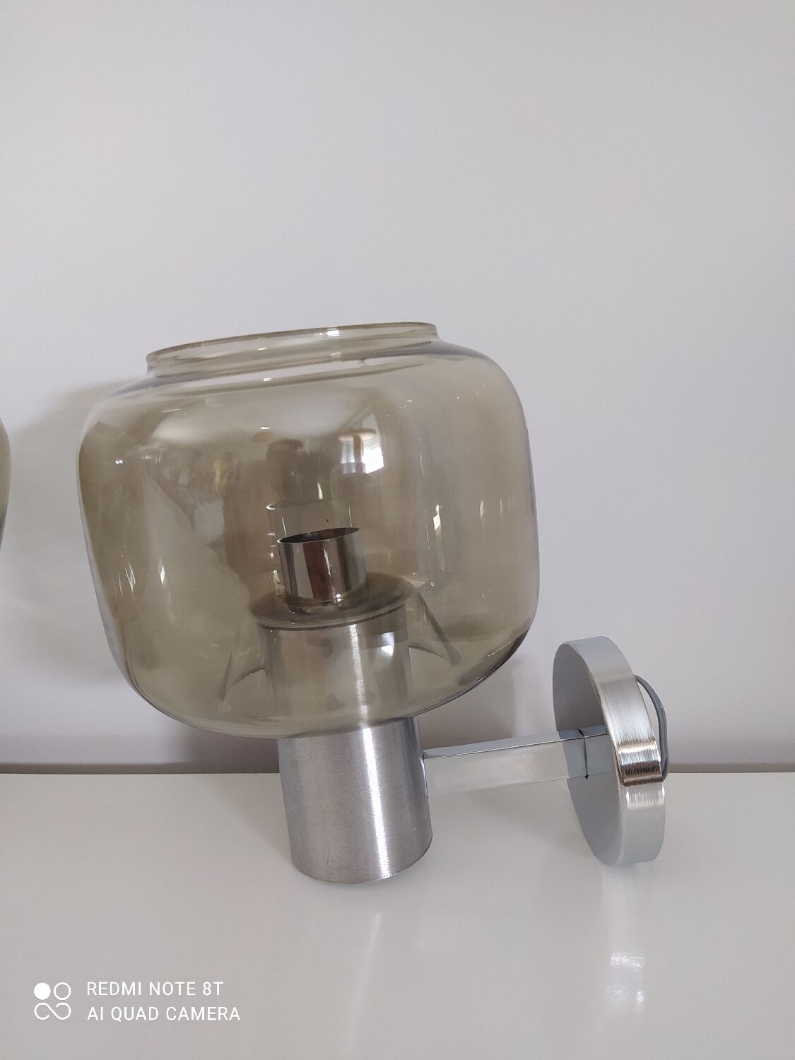 Pair of vintage chrome wall lights with smoked glass globe