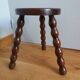 Turned wood tripod stool