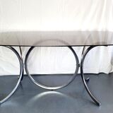 Dining table in chromed metal and smoked glass 1970