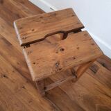 Antique wooden farm stool