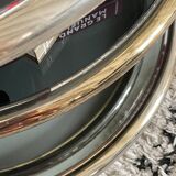 Milo Baughman vintage round coffee table with chrome swivel tops and smoked glass