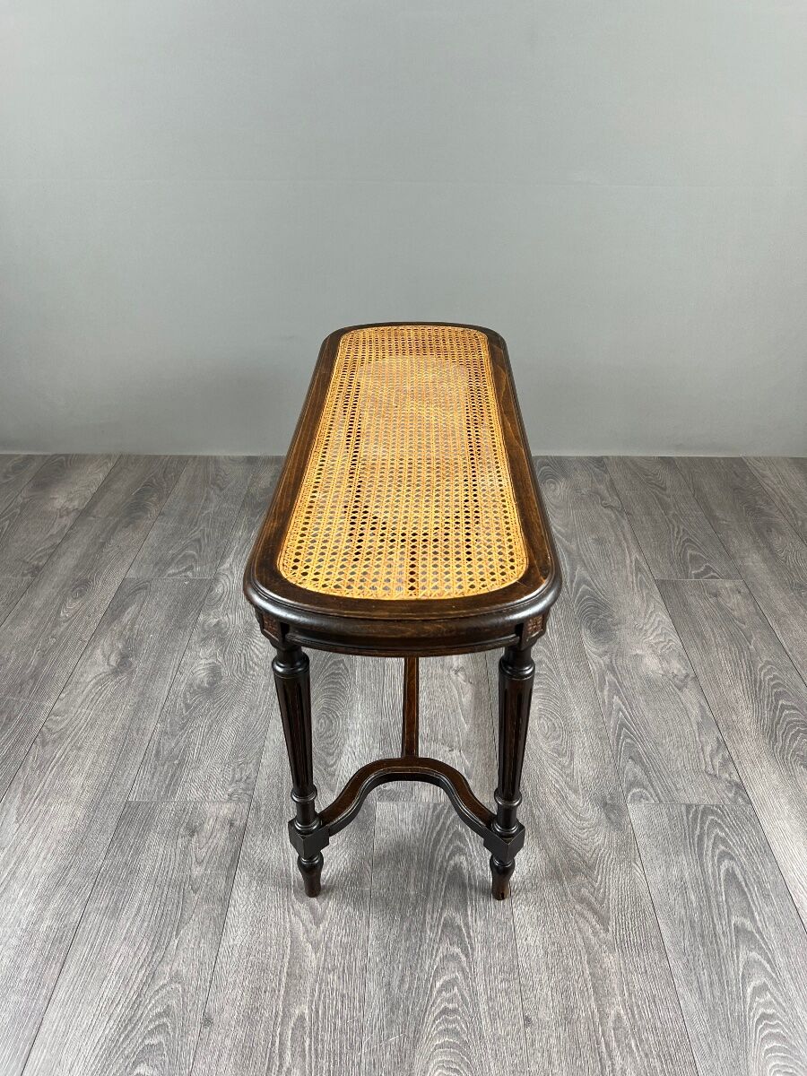 Antique wooden bench, caned seat, Louis XVI style, 20th century.