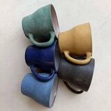 Set of five mugs from a 1960s Scandinavian studio.