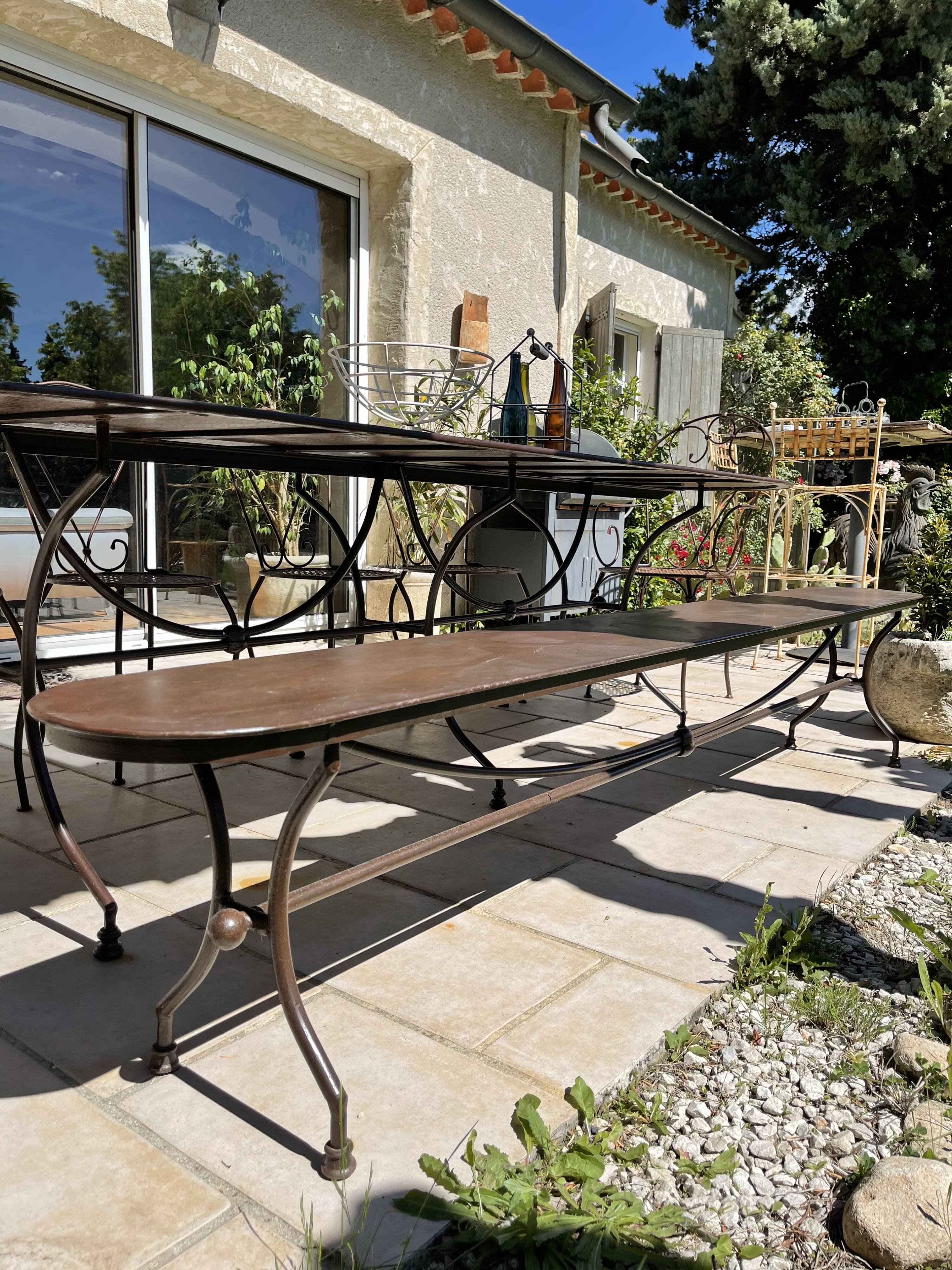 Artisanal wrought iron garden bench