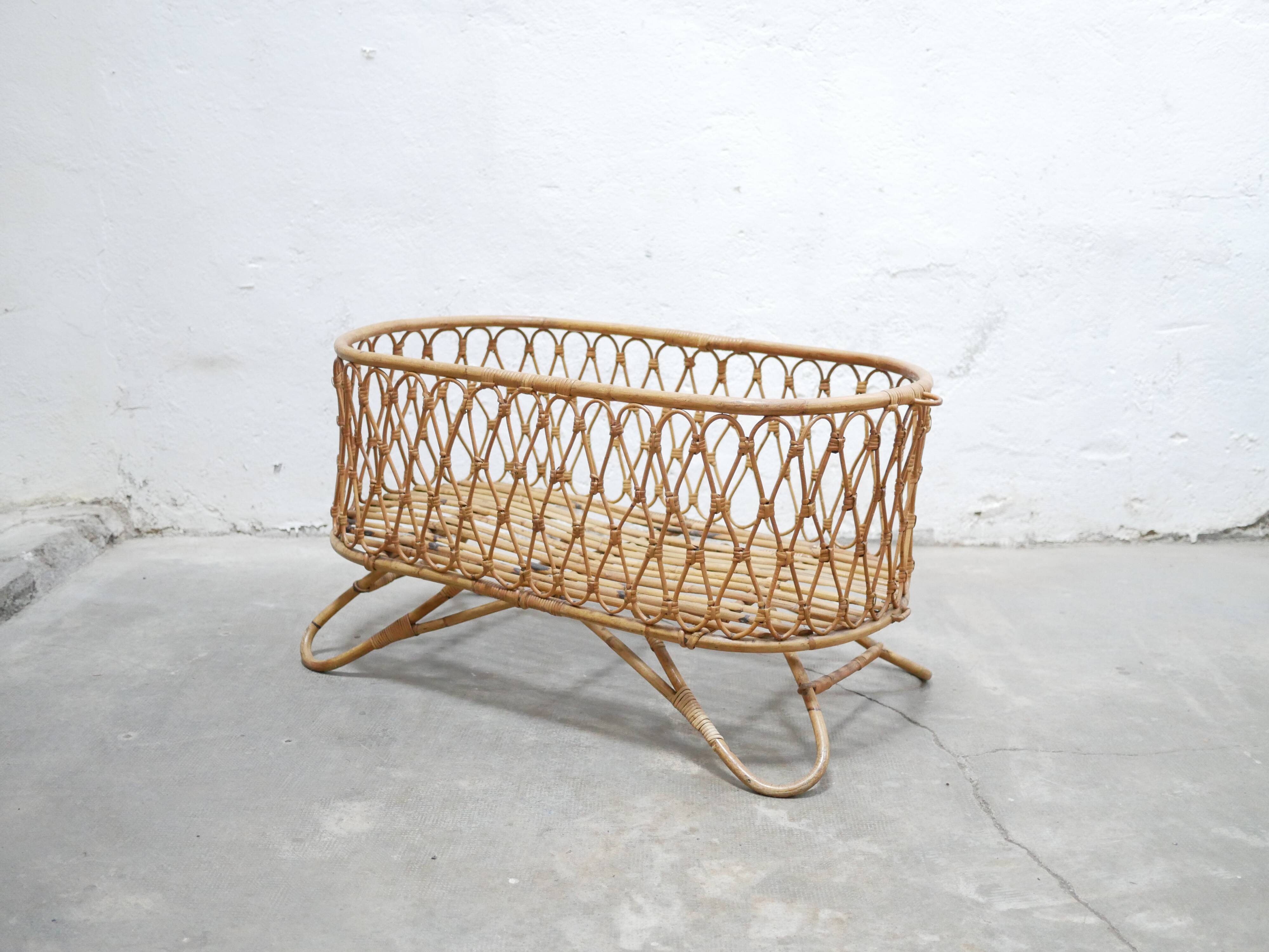 Vintage rattan cradle