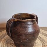 Glazed terracotta jug