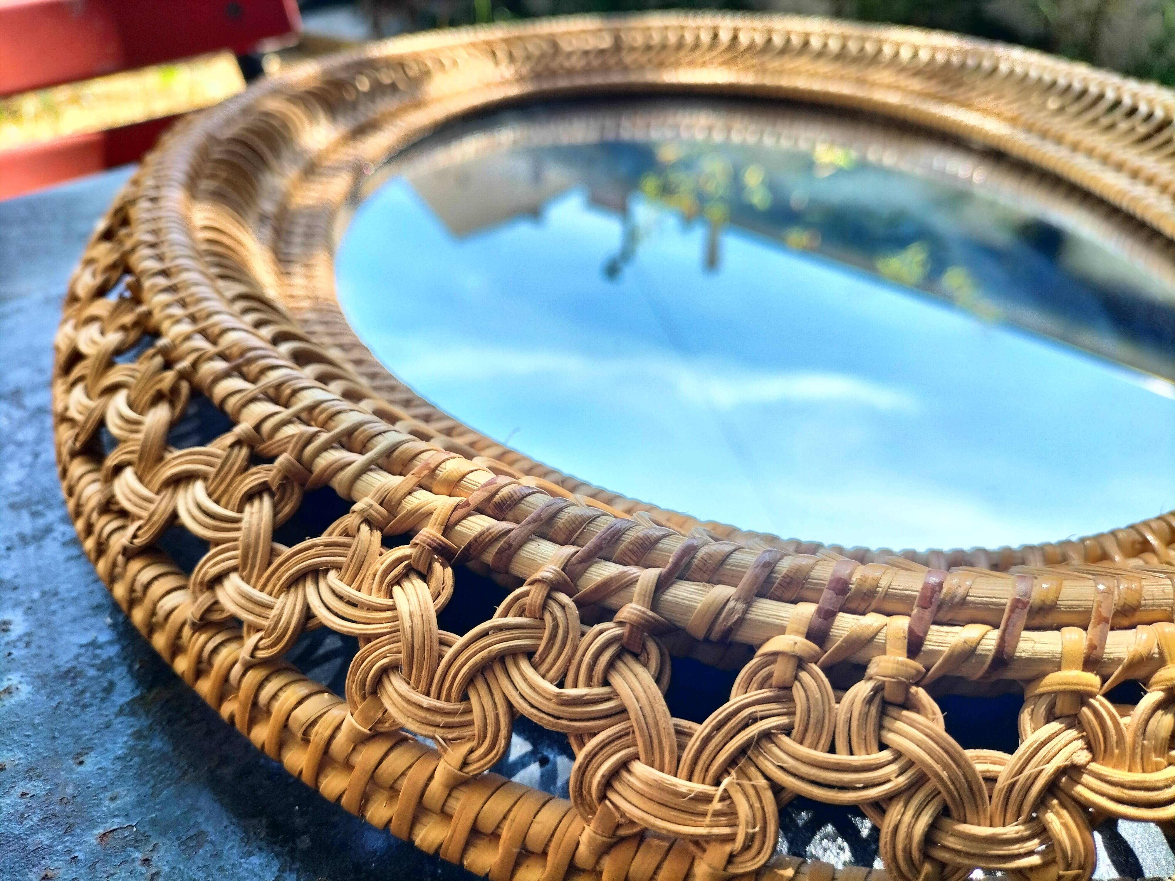 Oval rattan mirror