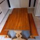 Solid oak table and its two benches made by a craftsman.