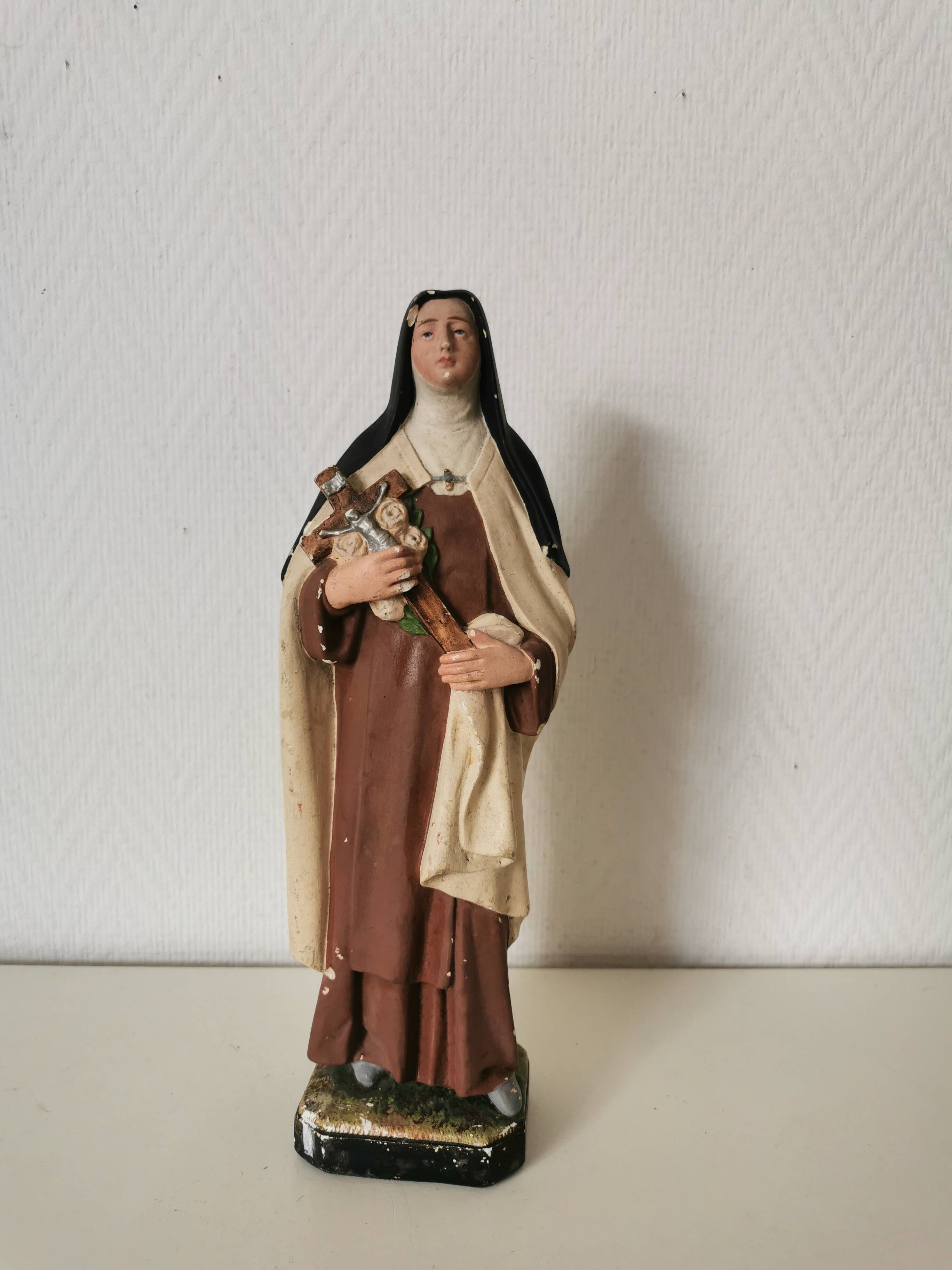 religious statue of Saint Therese of Lisieux in painted plaster