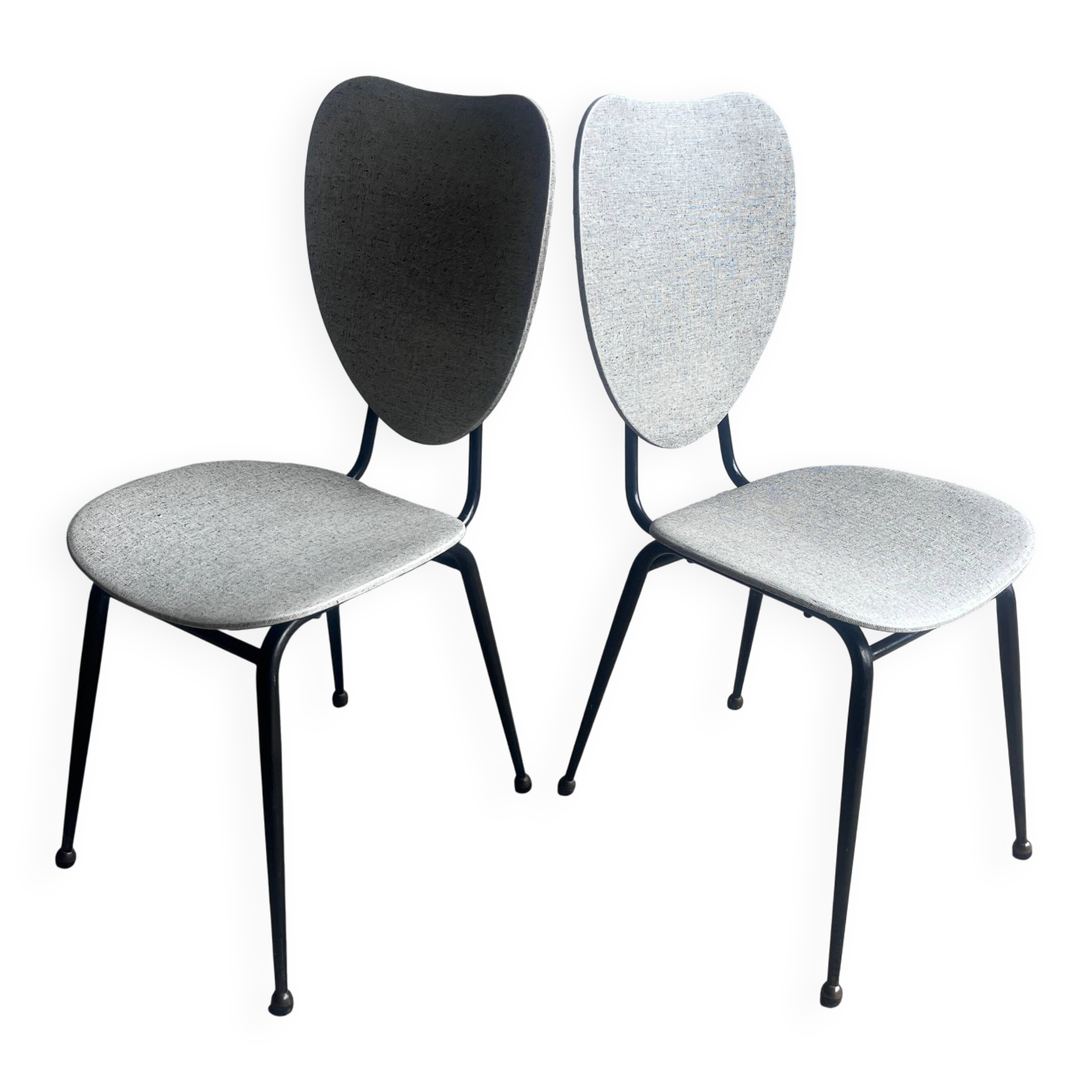 Elegant pair of French dining chairs by Jacques Hitier from the 1950s.