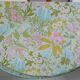 Nappe ronde à décor de fleurs vers 1970