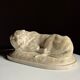 Marble sculpture of a reclining lion