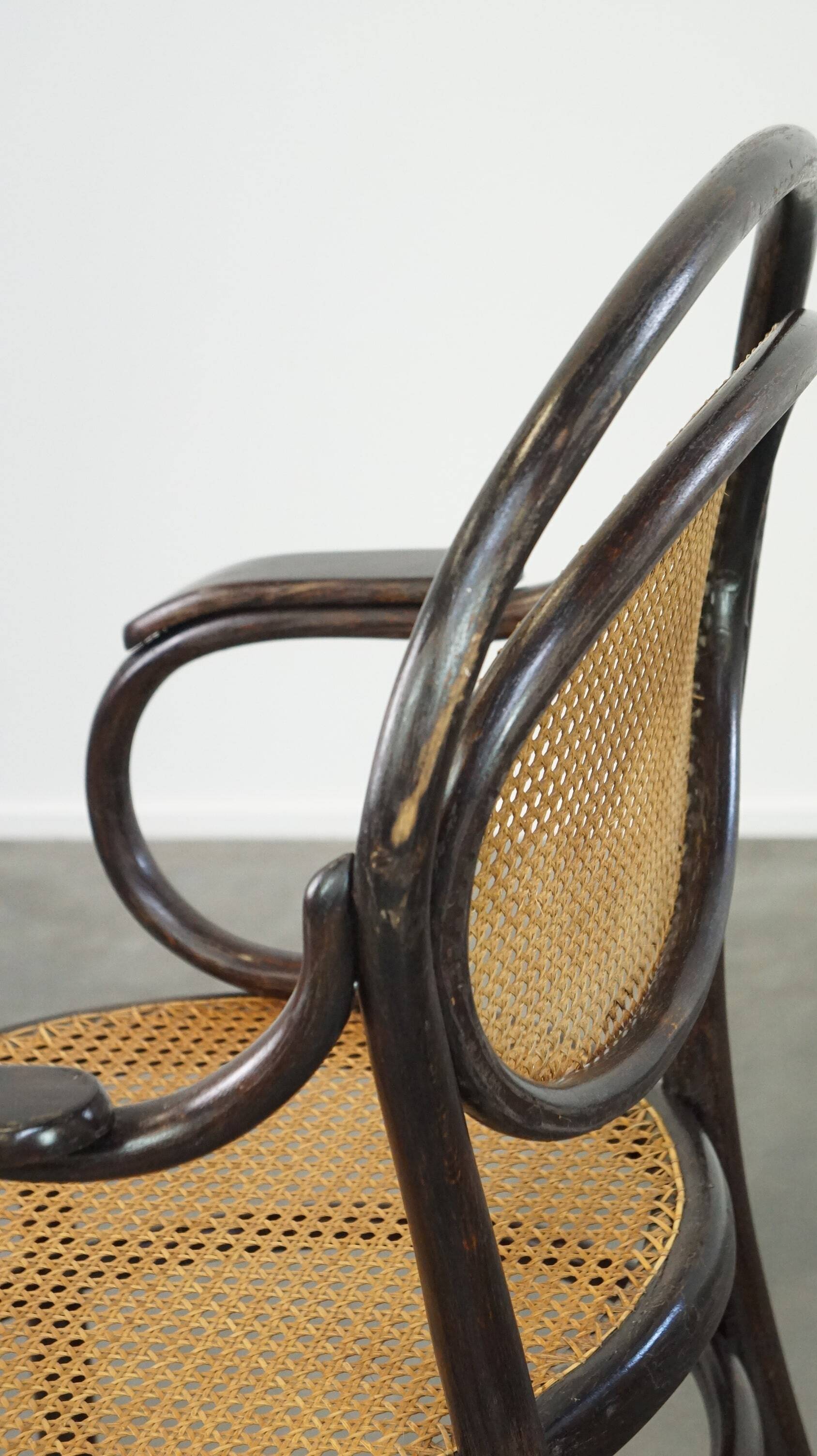 Very charming, elegant, vintage bentwood design bistro chair with comfortable armrests