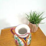 Porseleinen vintage roze kan met bloemen