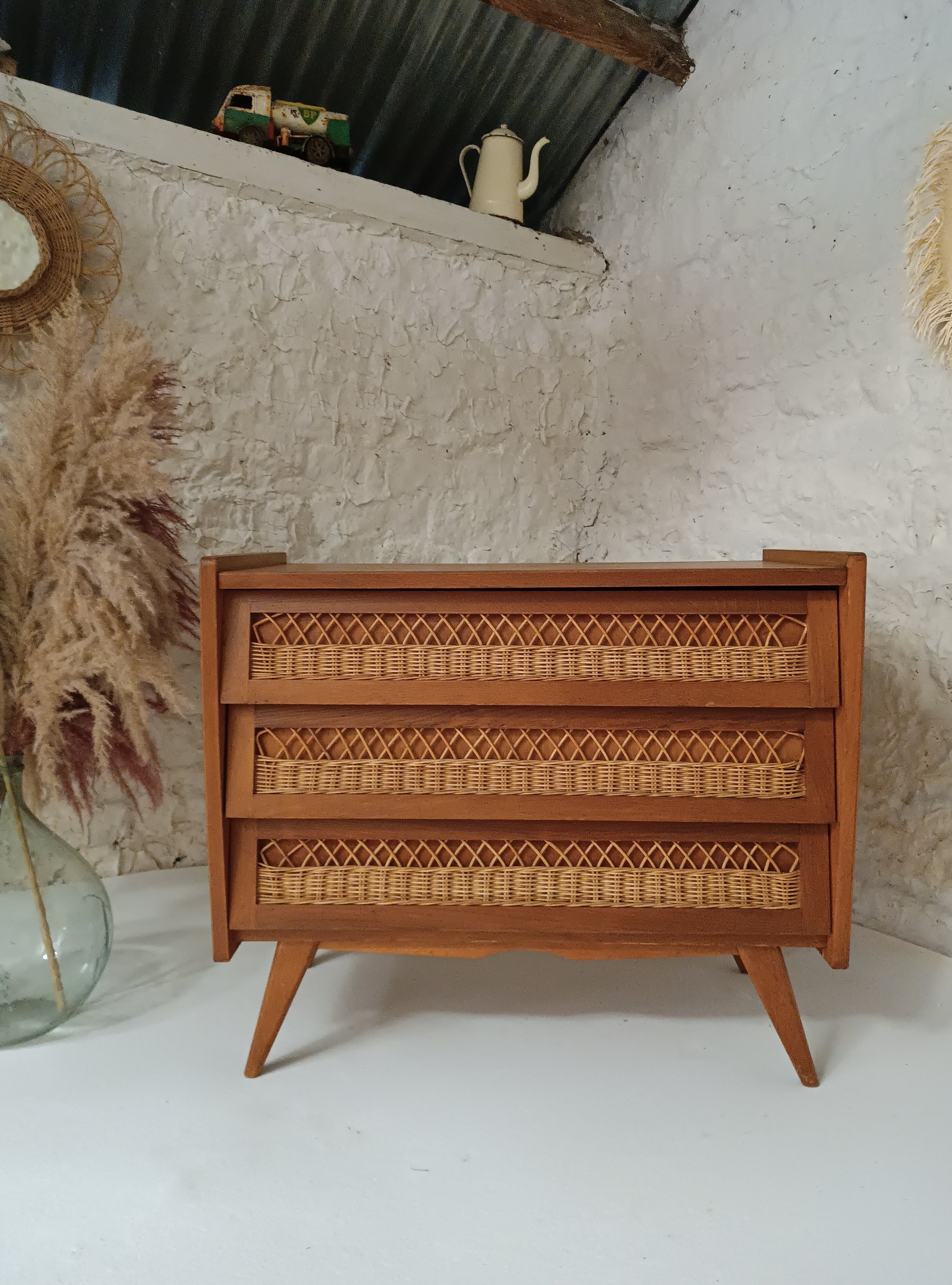 Vintage wooden and rattan chest of drawers in the 60s
