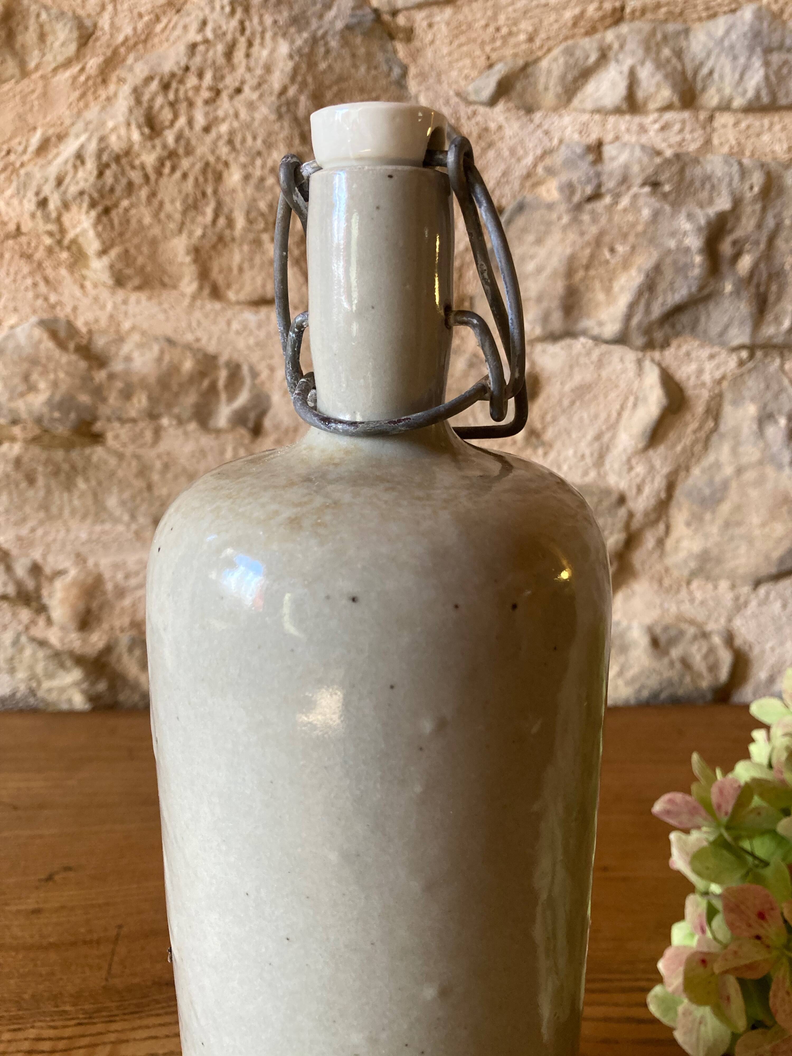 Bouteille bouillotte en grès émaillé gris clair