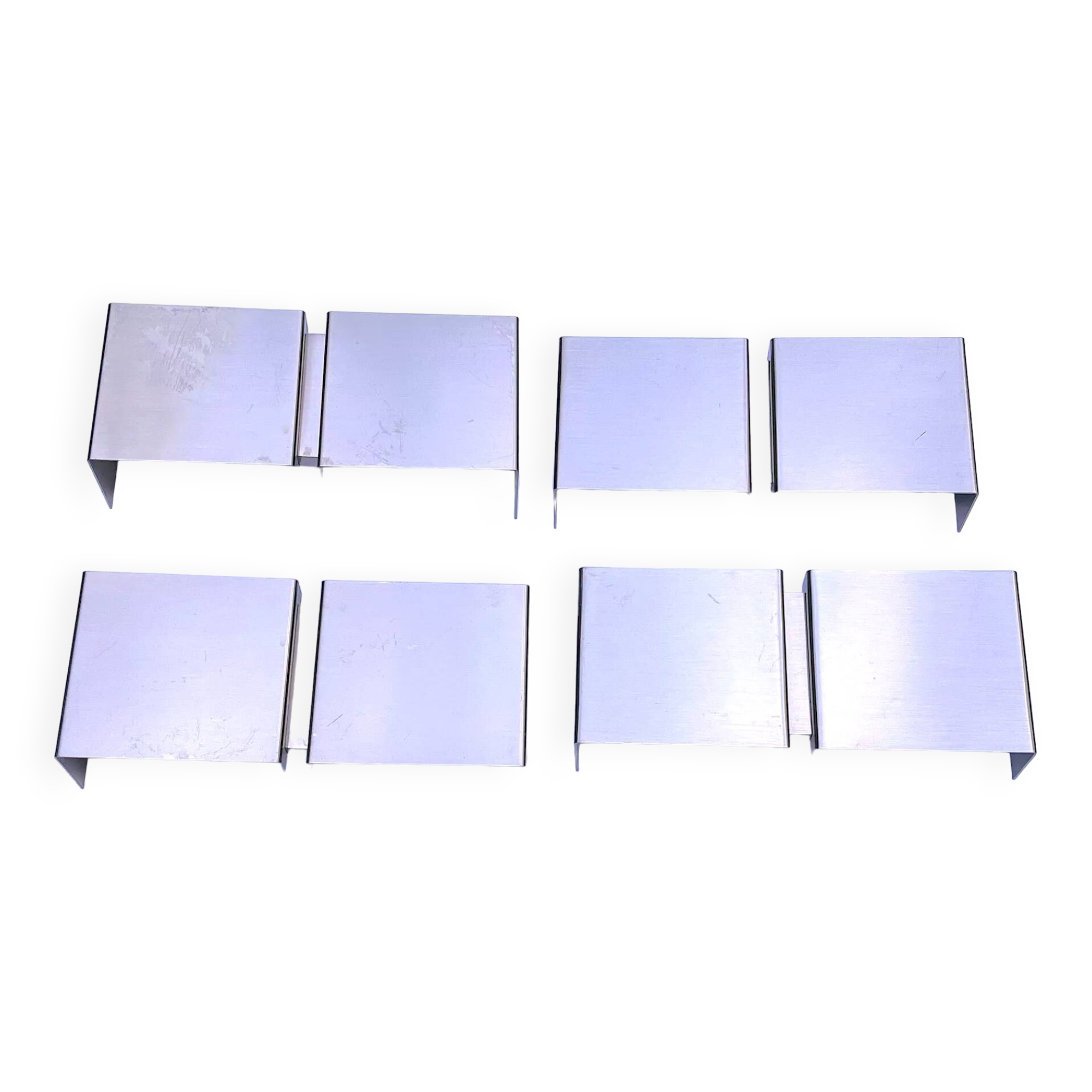 Four modern metal wall lights by Christophe Gevers for Axis71, Belgium