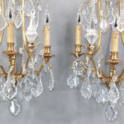Pair of Louis XVI style gilded bronze & bohemian crystal sconces