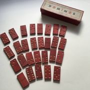 Red wooden dominoes game from the 50s old toy