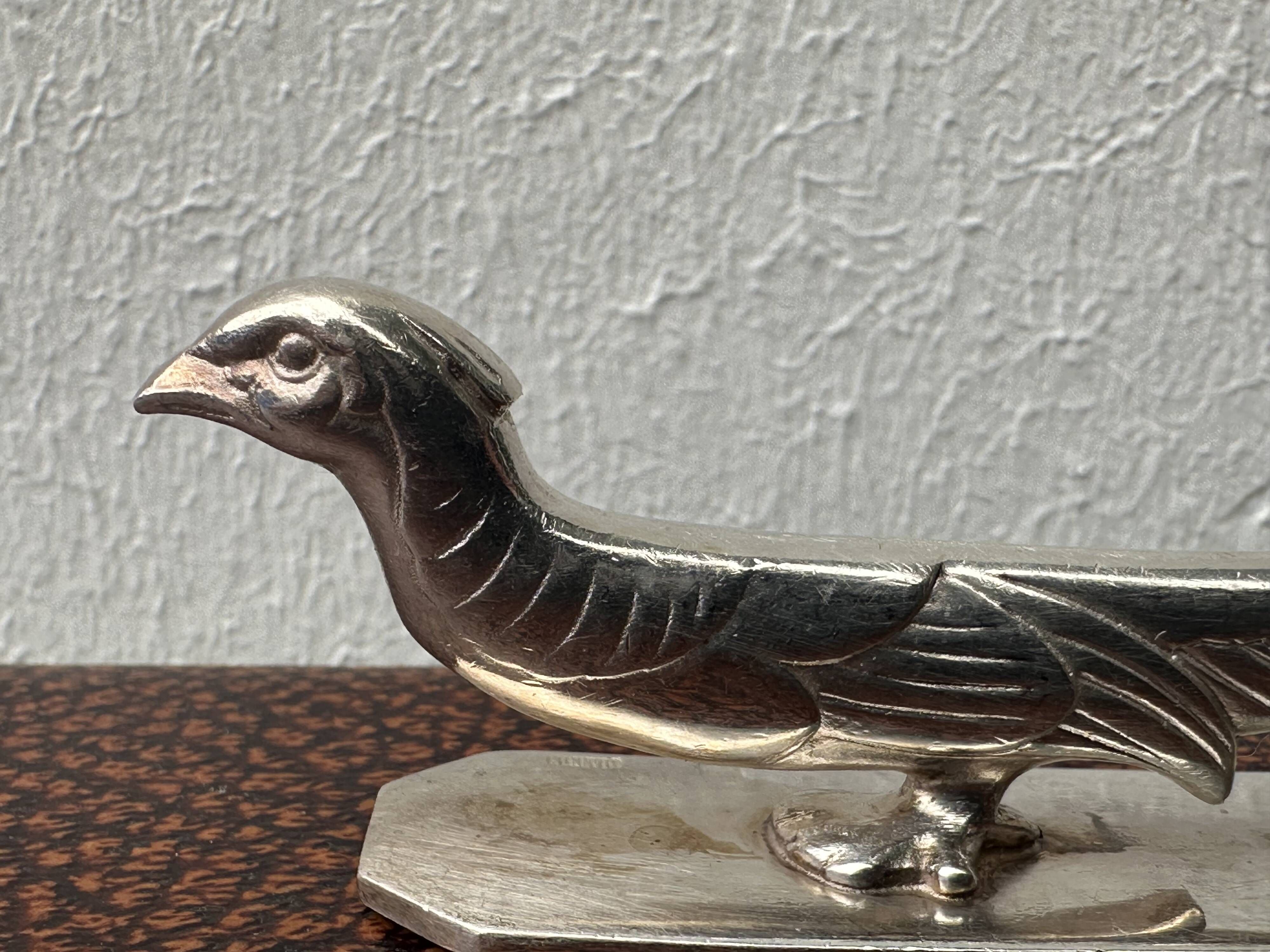 12 antique silver-plated bronze knife rests in modern art deco animal designs.