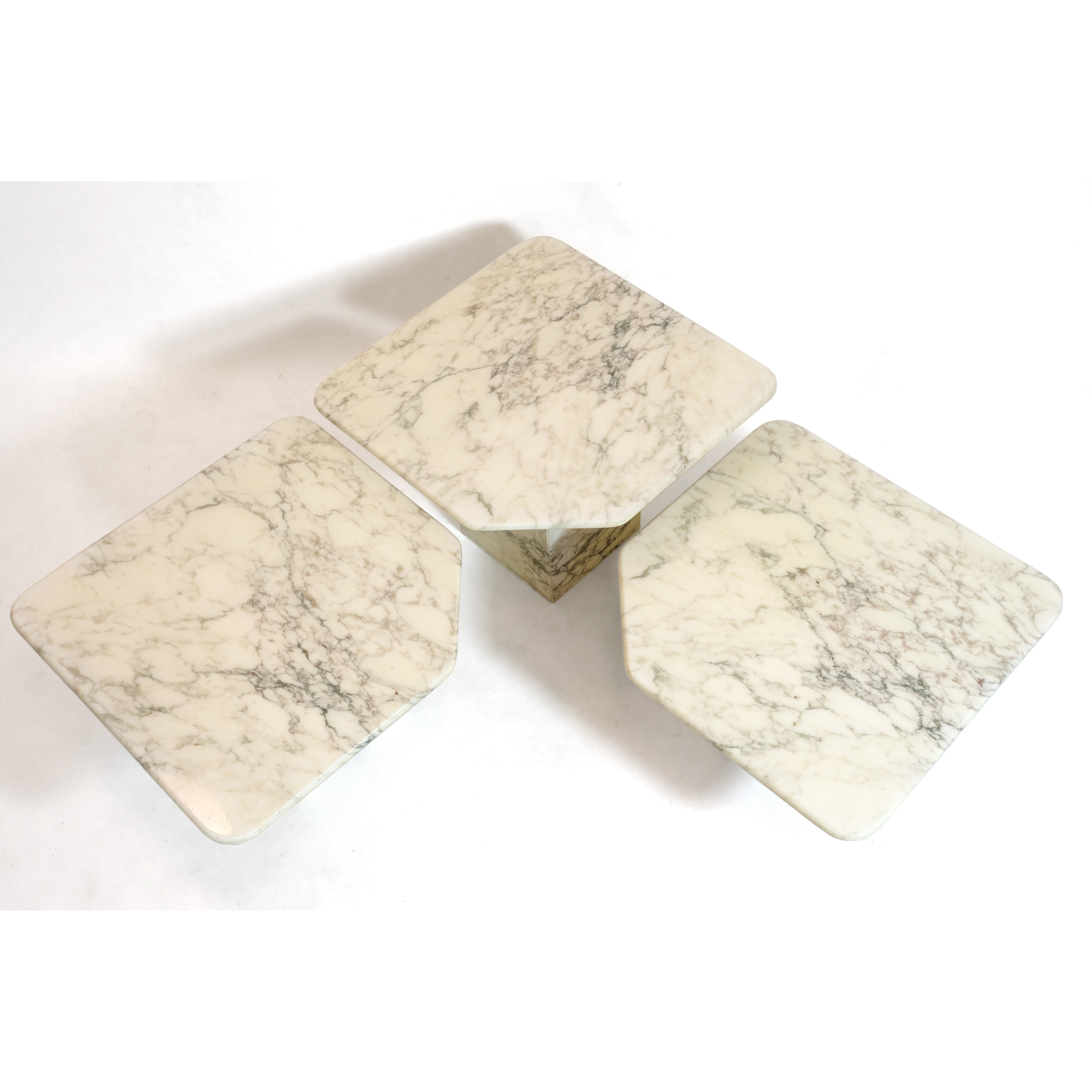 Suite of three marble trundle tables, 1970s
