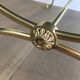 Neoclassical brass style coffee table with dolphin head decoration