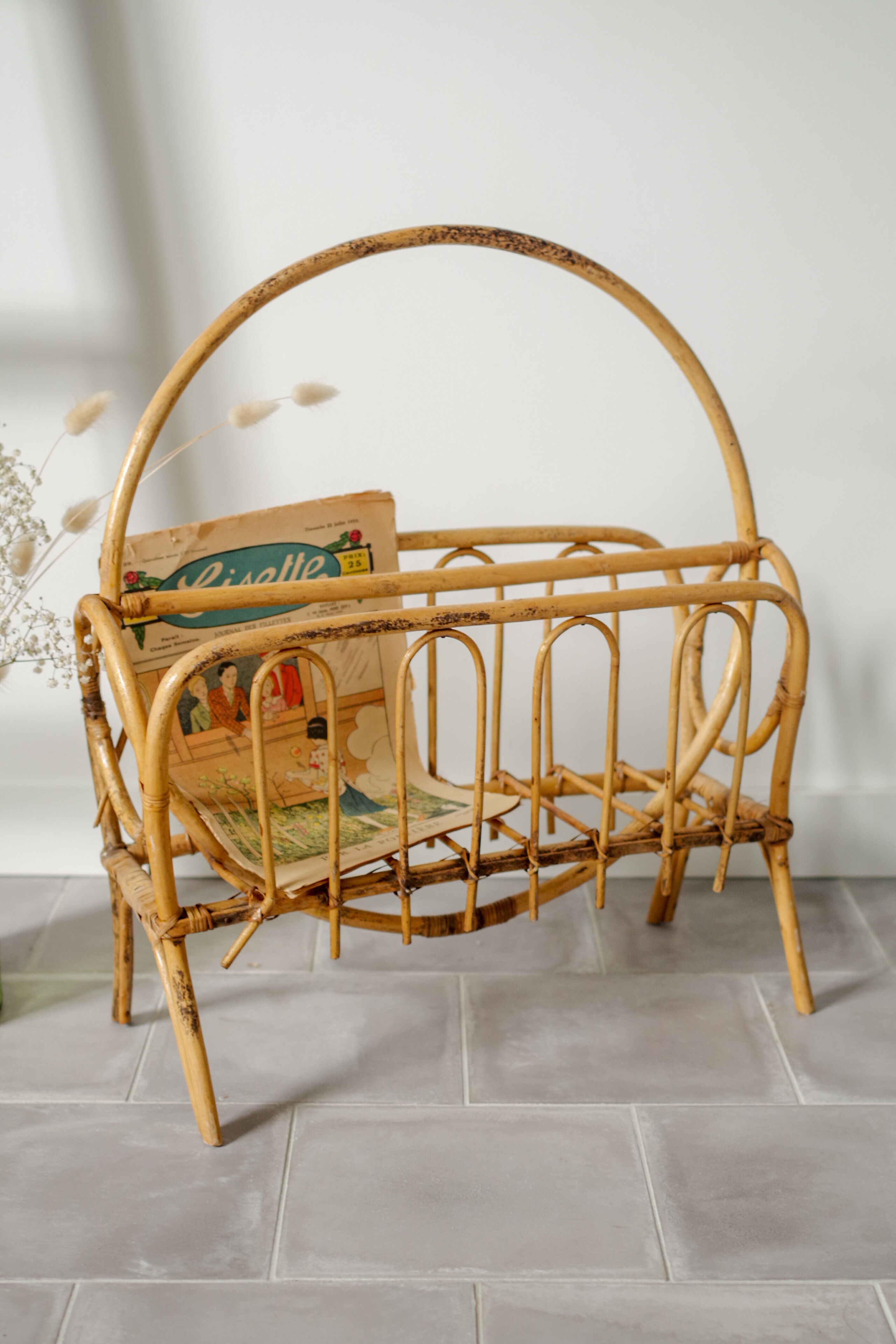 Old rattan magazines rack