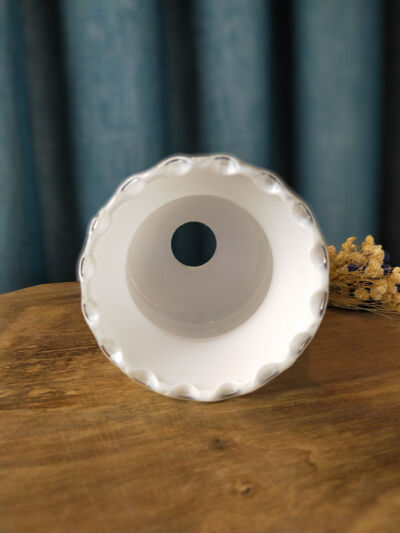 White opaline shaped like a lily of the valley bell