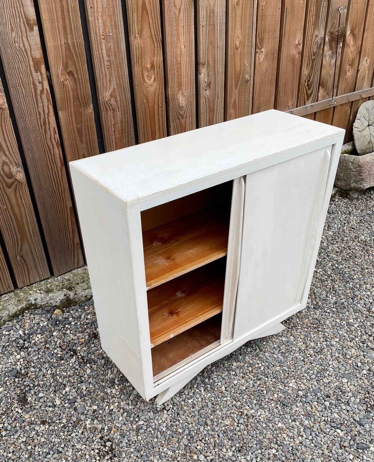 Vintage sideboard with sliding doors
