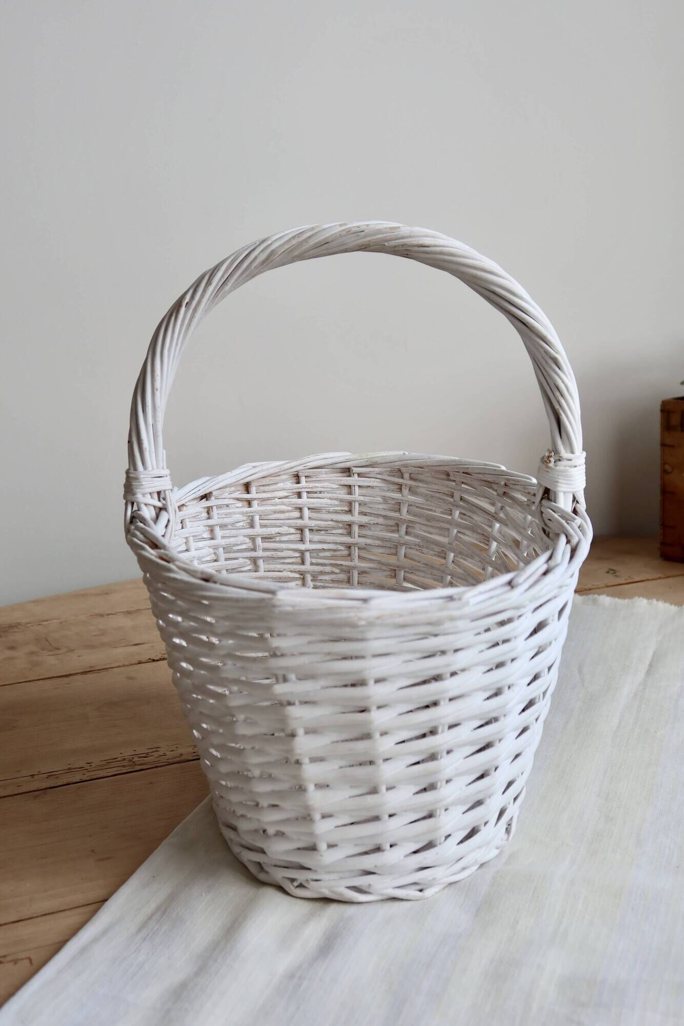Vintage wicker basket painted white