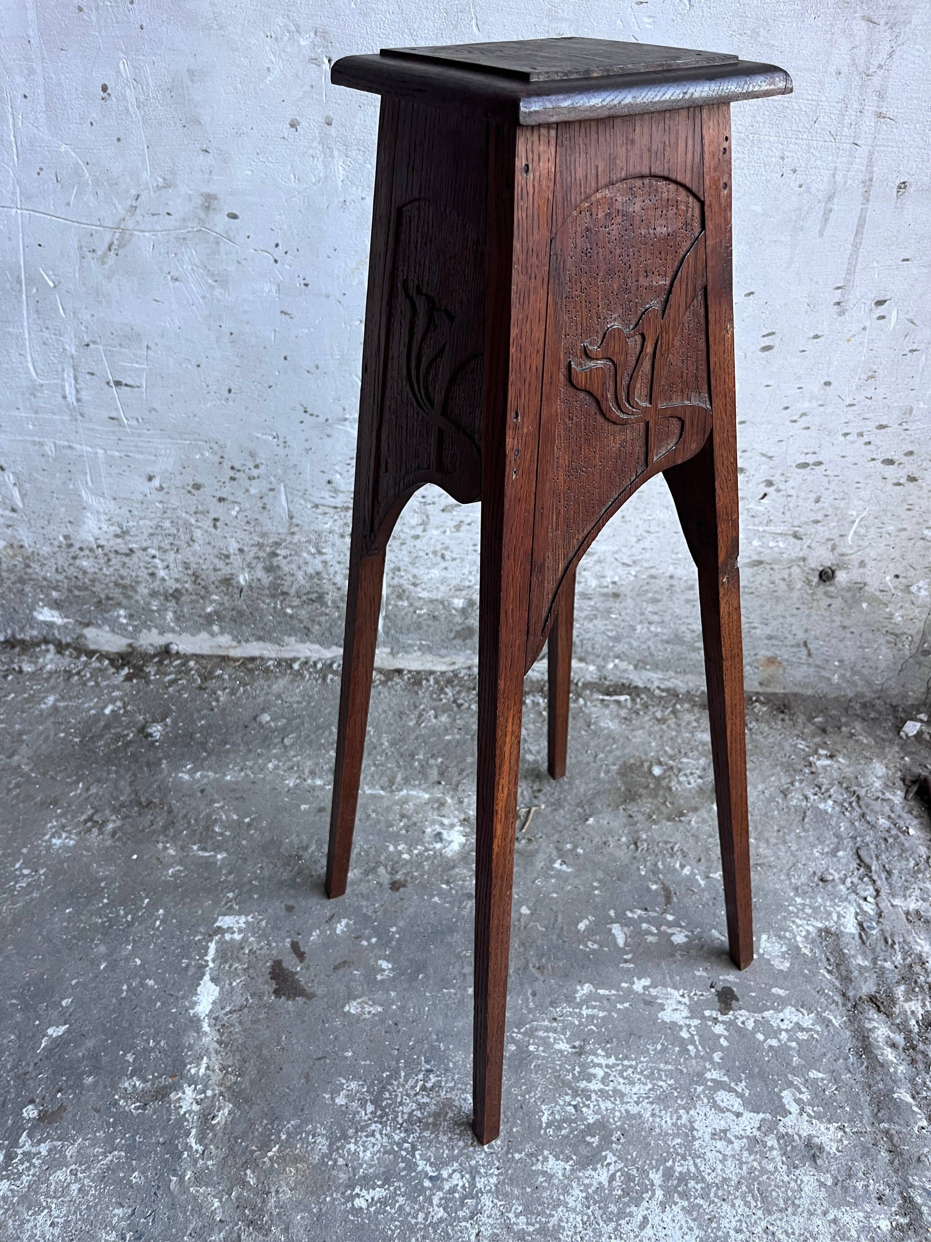 Sculpted wooden plant stand in Art Nouveau style, circa 1910.
