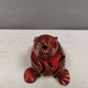 Beautiful seal in ceramic with metallic red glaze.