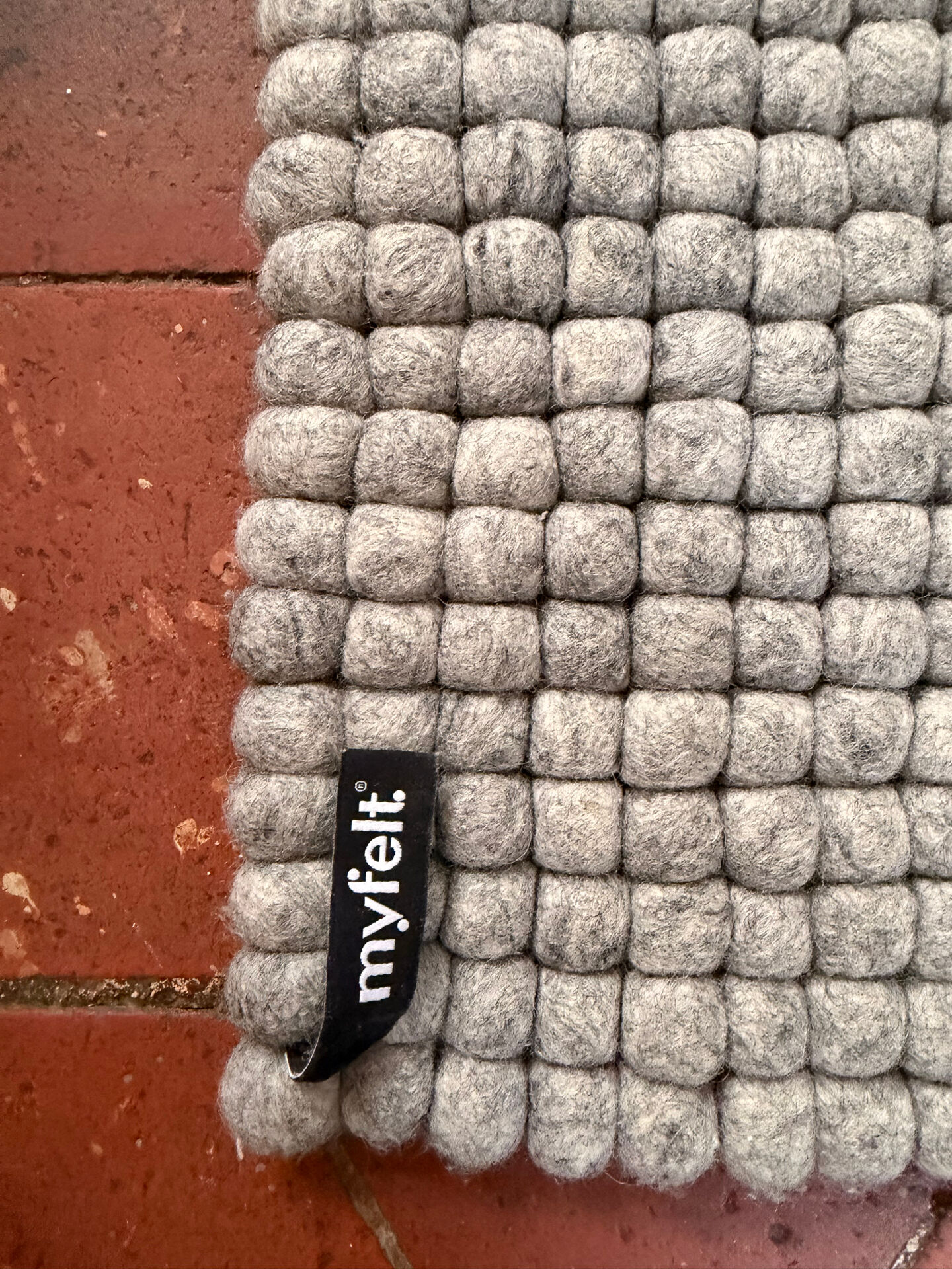 Myfelt rug made of virgin wool felt balls.