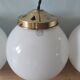 Lot de 3 suspensions art deco avec globe en opaline blanche