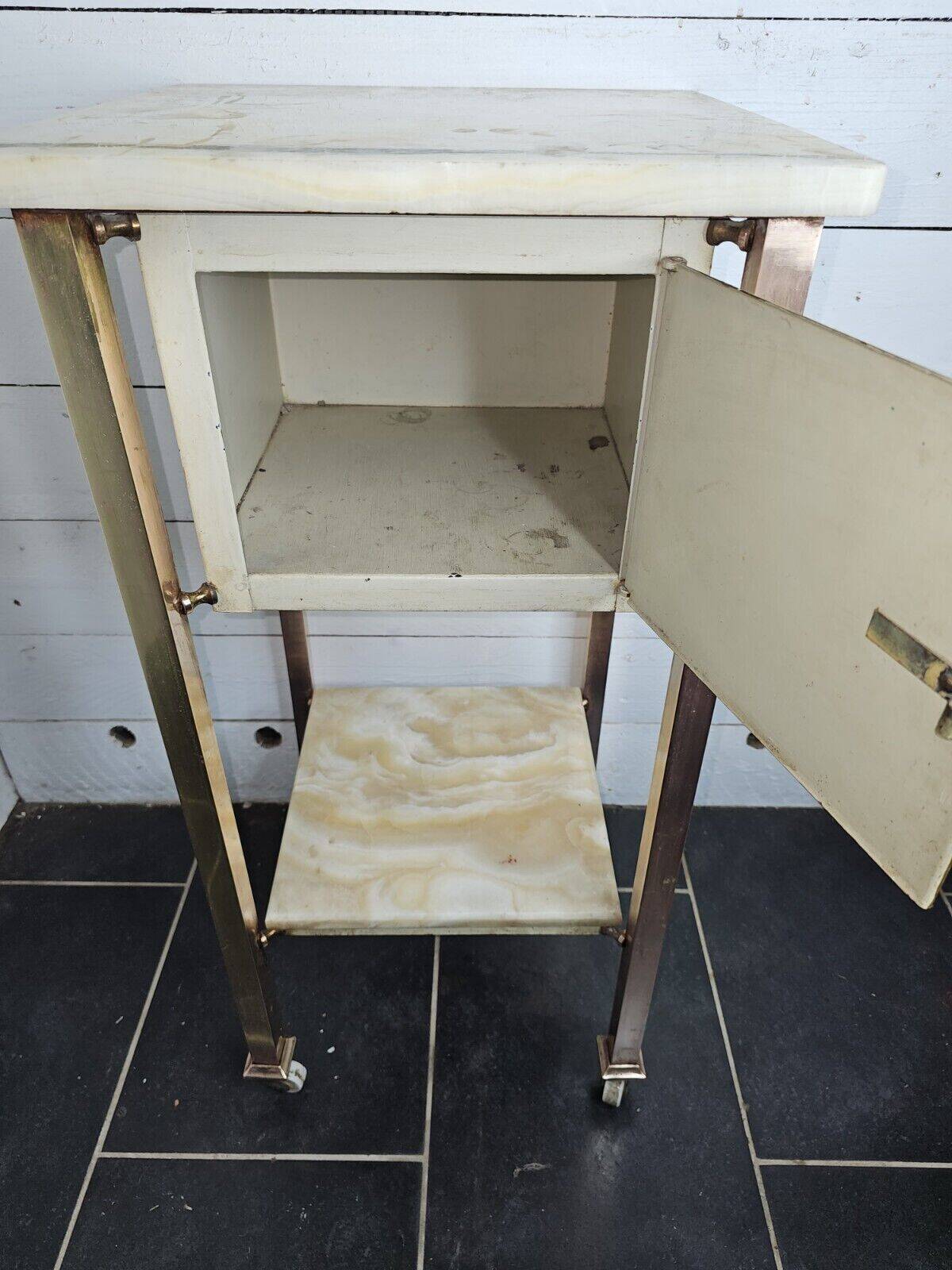 Bedside table in patinated iron, brass and marble tops