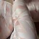 Pair of Hollywood Regency style cabriolet armchairs in satin pink, 1970s.
