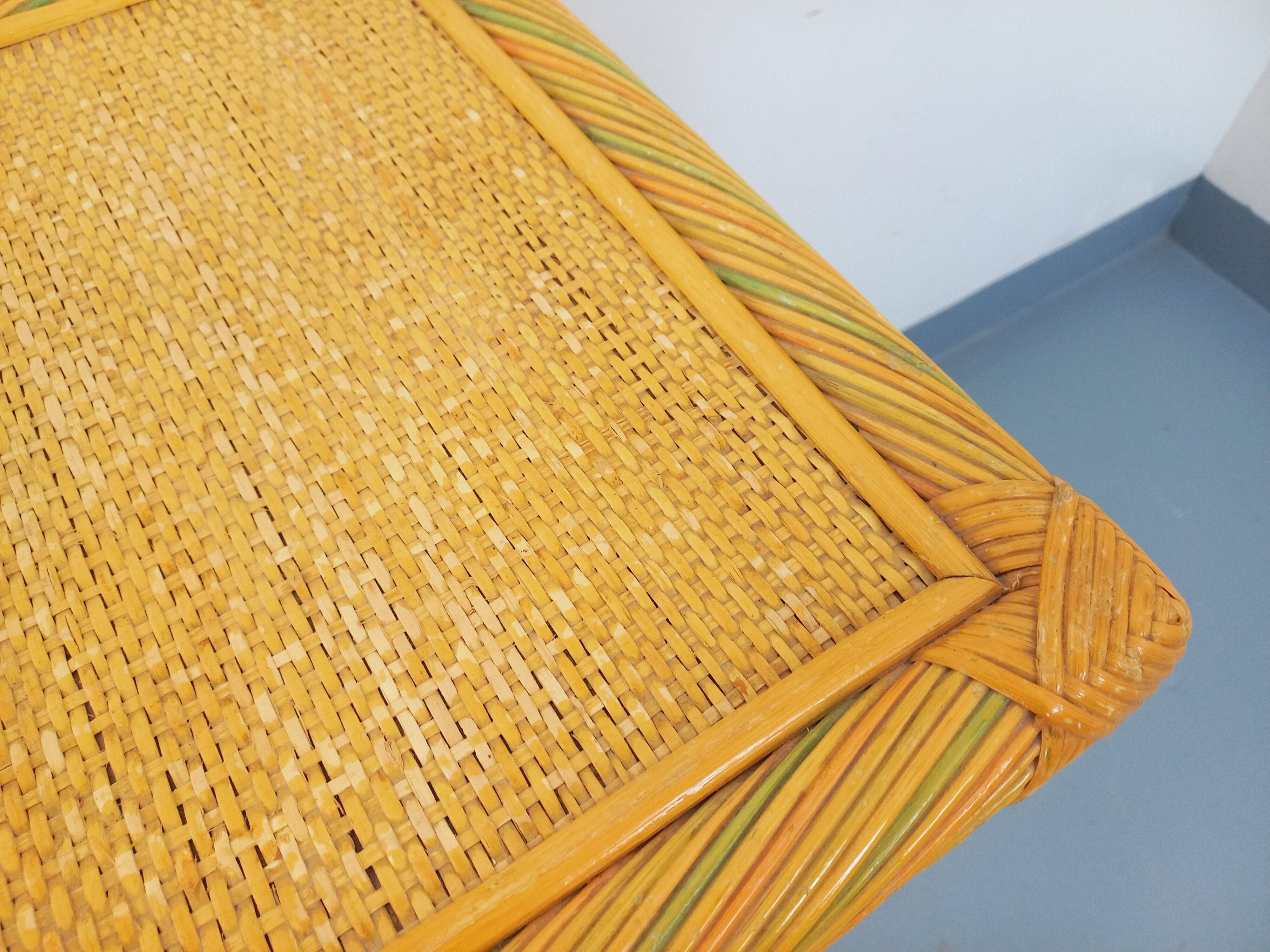 Vintage storage unit in rattan and woven rattan from the 1970s.