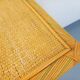 Vintage storage unit in rattan and woven rattan from the 1970s.