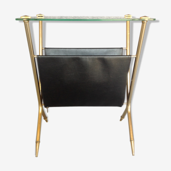 Table is reviewed in glass and gold metal