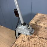 Grey two-arm Kaiser Idell clamp lamp model