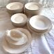 Service of 53 pieces of plates and dishes by Villeroy & Boch in cream and gold, model Saar.
