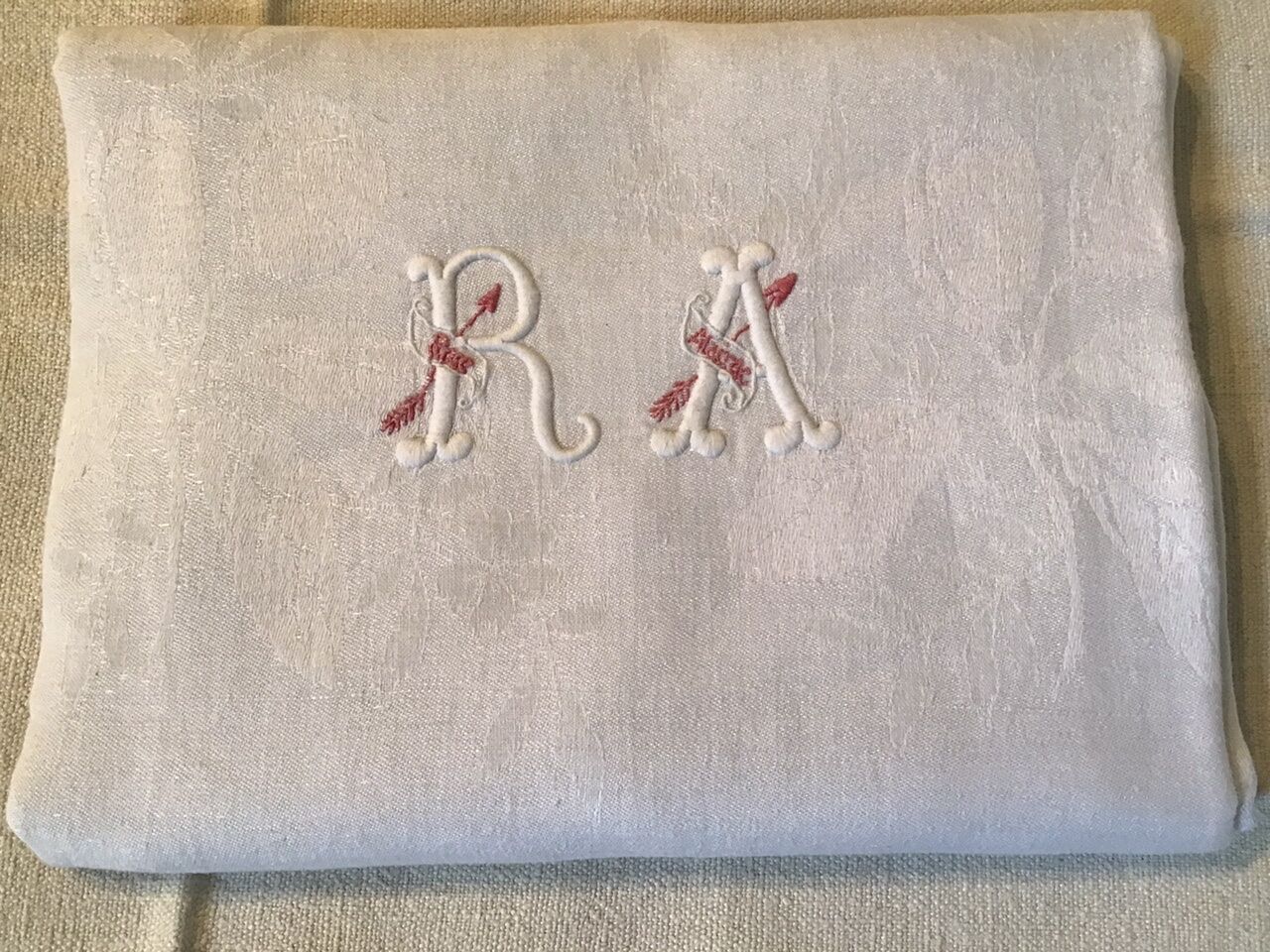 Square linen tablecloth marked RA