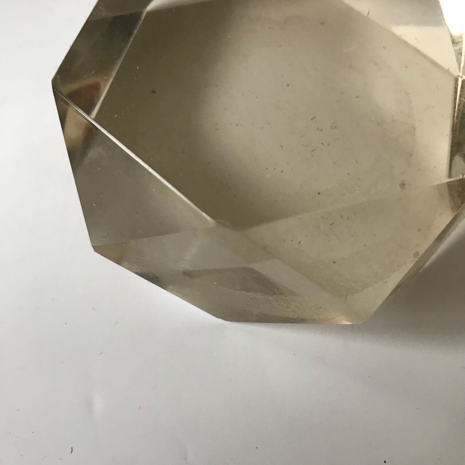 vinatge glass paper press has facets