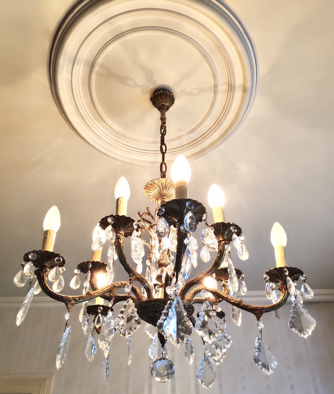 Bronze chandelier with tassels