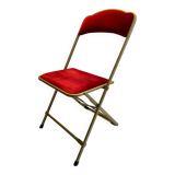 Velvet folding chair with gold metal.