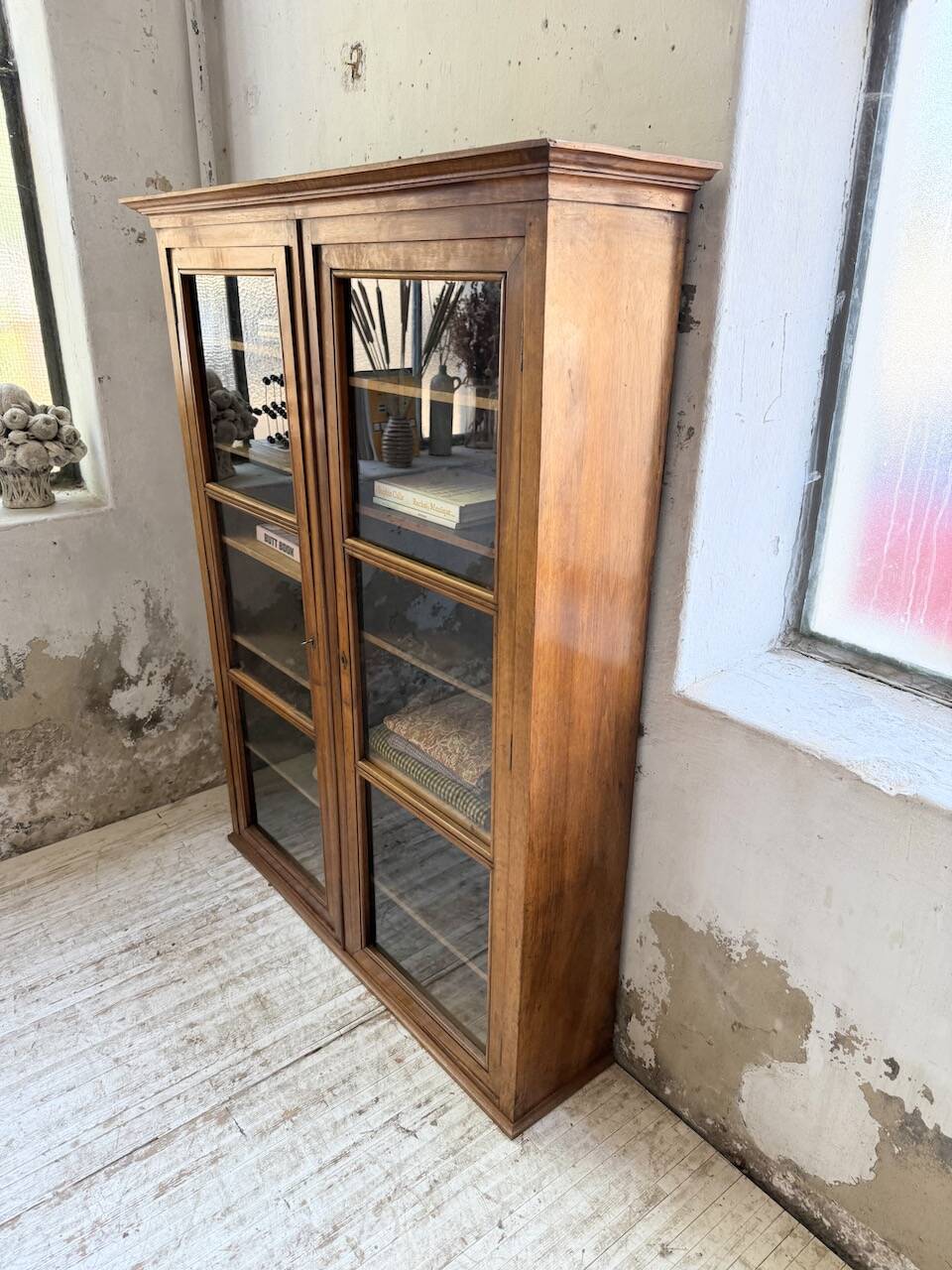 Glass-fronted walnut library 1900