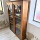 Glass-fronted walnut library 1900