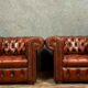 Pair of Chesterfield club armchairs in burgundy circa circa 1920 upholstered leather