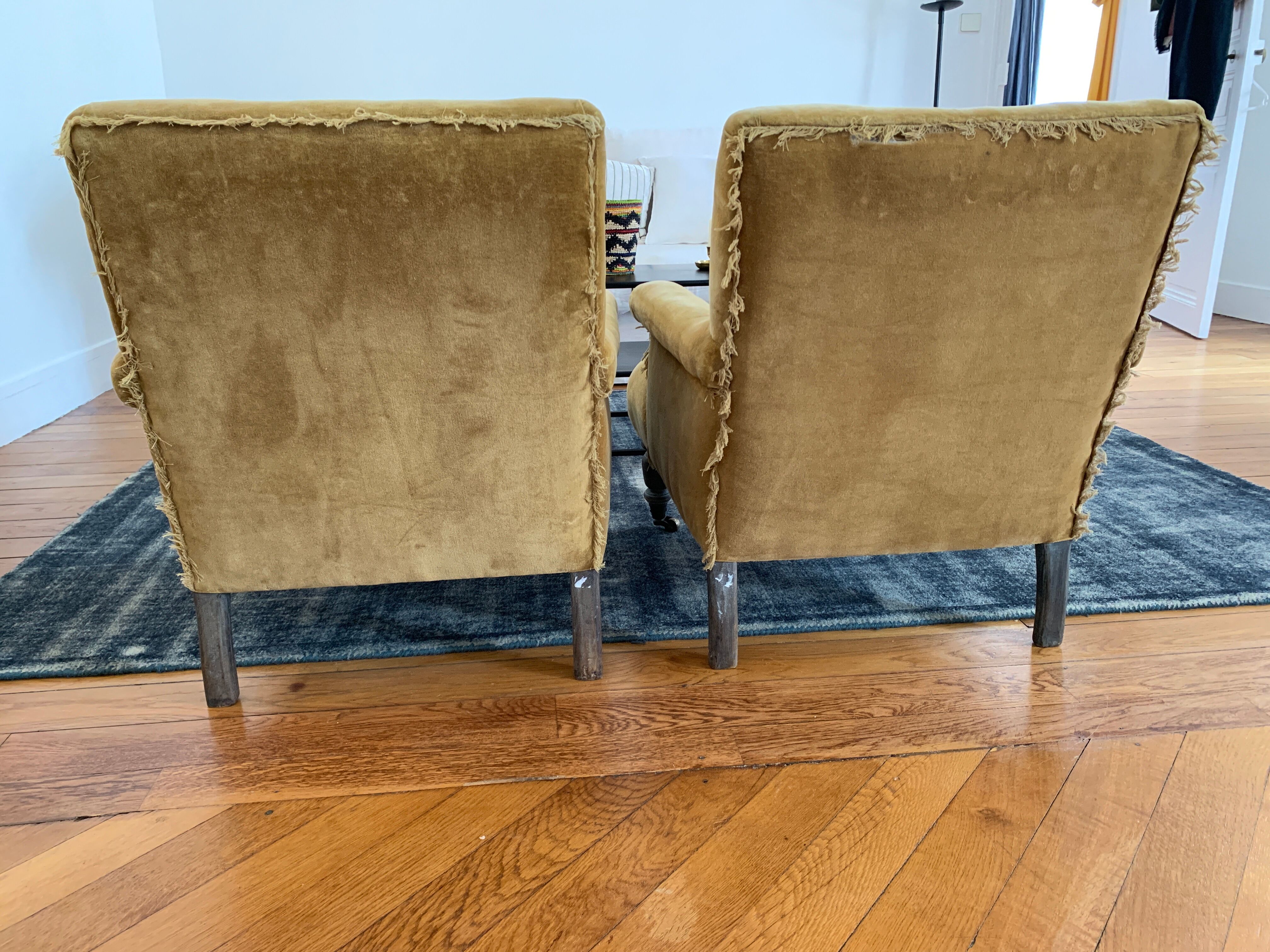 2 mustard velvet armchairs
