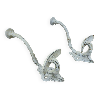 Pair of enameled cast iron coat hooks, 19th